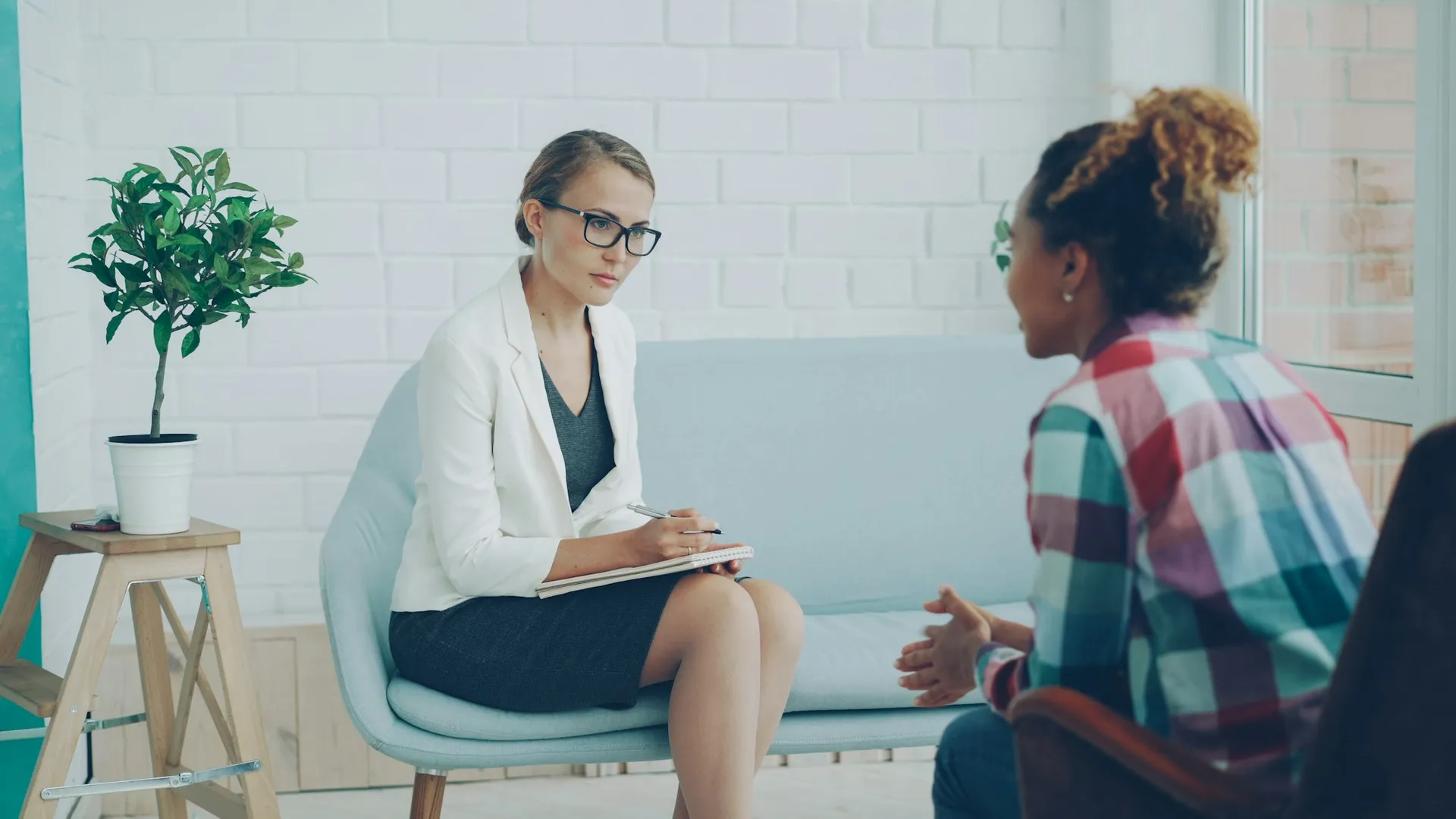 A therapist listening during a counseling session